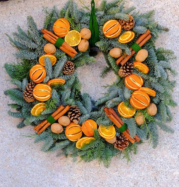 Ghirlanda orange e cinnamon di Natale Flowerart shop online fiorista legnano negozio fiori